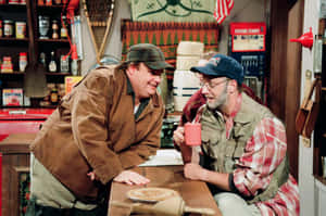 Comedic Scenein Rustic Setting Wallpaper