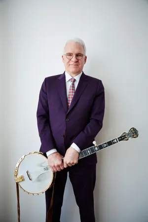Comedy Icon Steve Martin In Charismatic Pose Wallpaper