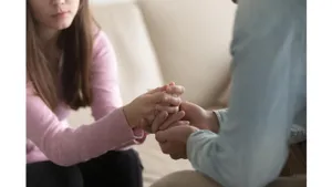 Comforting Hand Hold Emotional Support Wallpaper