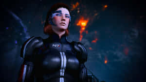 Commander Femshep Striking A Dynamic Pose In Mass Effect Wallpaper