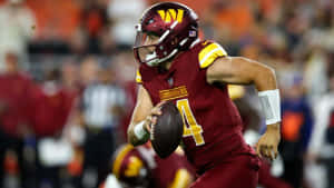 Commanders Quarterback Action Shot Wallpaper