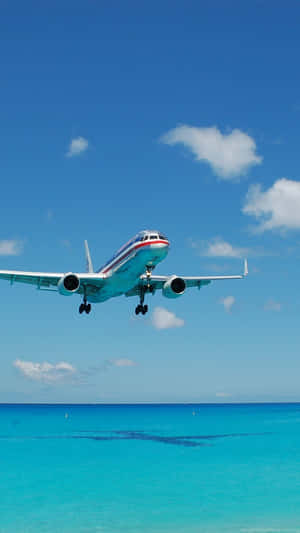 Commercial_ Airplane_ Landing_ Tropical_ Waters.jpg Wallpaper