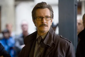 Commissioner Gordon Standing Strong In Gotham City Wallpaper