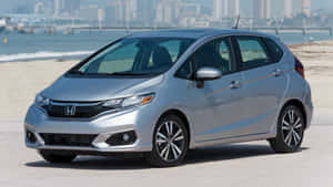 Compact Car: Stylish And Efficient City Drive Wallpaper