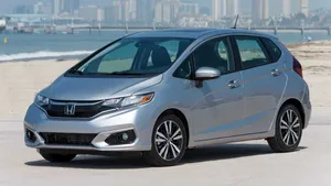 Compact Car: Stylish And Efficient City Drive Wallpaper