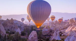 Company Office With Focused Employee At Computer Wallpaper