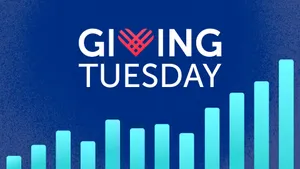 Compassionate Hands Offering Charity On Giving Tuesday Wallpaper