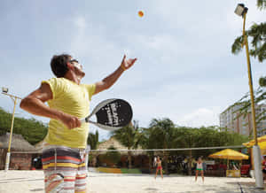 Competitive Beach Tennis Game Wallpaper