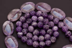 Complete Your Look With Beautiful, Brilliant Purple Jewelry. Wallpaper