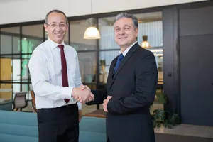 Complete Your Outfit With A Stylish Navy Blue Tie. Wallpaper