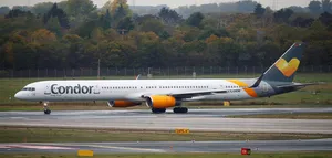 Condor Airlines Ariplane Taxiing On The Runway Wallpaper