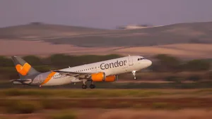 Condor Airlines Plane Ascends To The Skies Wallpaper