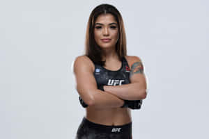 Confident Female Fighter U F C Attire Wallpaper