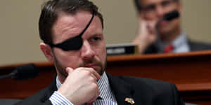 Congressman_with_ Eyepatch_in_ Hearing Wallpaper