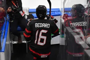 Connor Bedard Hockey Player Reflection Wallpaper
