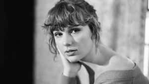 Contemplative Blackand White Portrait Wallpaper