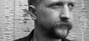 Contemplative Man Blackand White Portrait Wallpaper