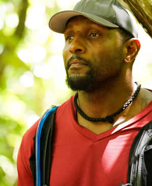 Contemplative Man Outdoors Wallpaper