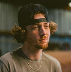 Contemplative Manin Cap Wallpaper