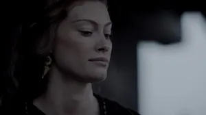 Contemplative Woman Dark Backdrop Wallpaper