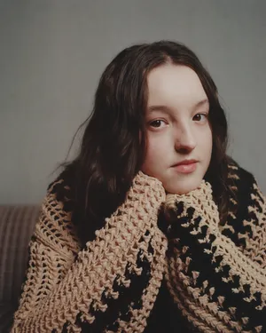 Contemplative Young Actress Portrait Wallpaper