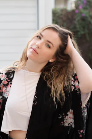 Contemplative Young Woman Floral Kimono Wallpaper