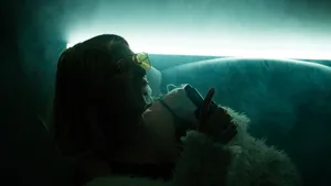 Contemporary Fashion - Chic Girl Smoking In Style Wallpaper