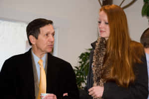 Conversation Of Dennis Kucinich With Her Wife Wallpaper