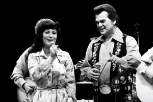 Conway Twitty Performingon Stage Wallpaper