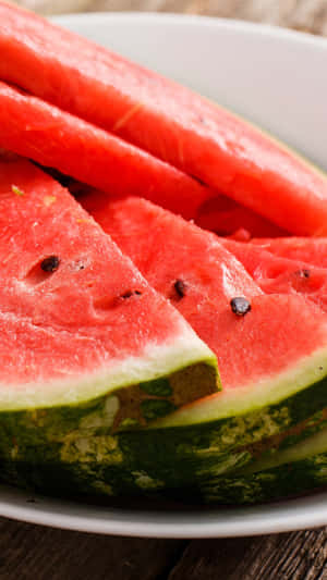 Cool And Crunchy - Enjoy A Slice Of Watermelon With Your Iphone. Wallpaper