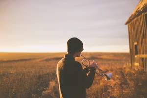 Cool Guy Playing Trumpet Wallpaper