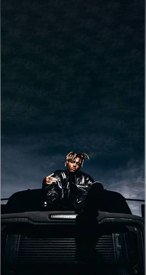 Cool Juice Wrld On A Vehicle’s Hood Wallpaper