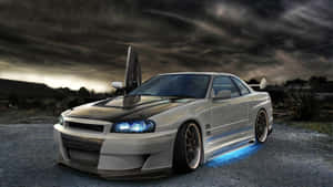 Cool Nissan Skyline Speeding Through The Night Wallpaper