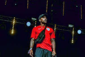 Cool Skepta On Red Shirt Wallpaper