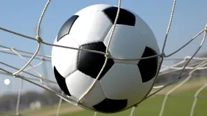 Cool Soccer Ball On Net Wallpaper