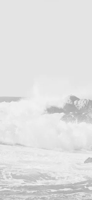 Cool White Waves On Rocks Wallpaper