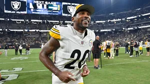 Cornerback Celebrationat Stadium Wallpaper