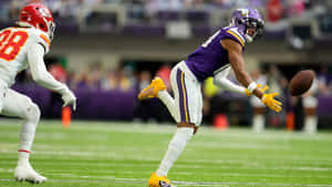 Cornerback In Action During Game.jpg Wallpaper