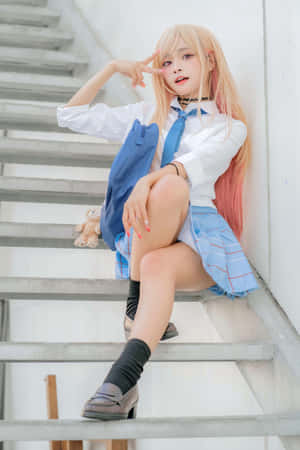 Cosplayer Dressed As A Cute Anime Character With A Beautiful Landscape Background Wallpaper