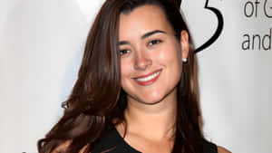 Cote De Pablo Smiling Portrait Wallpaper