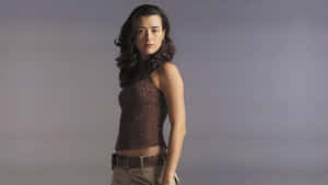 Cote De Pablo Stylish Portrait Wallpaper