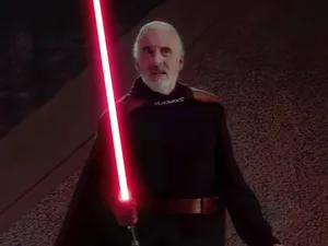 Count Dooku With Red Lightsaber Wallpaper