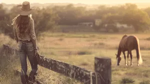 Country Cowgirl Sunset Grazing Horse.jpg Wallpaper