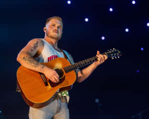 Country Music Artist Performing Live Wallpaper