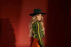 Country Music Artistin Green Hat Wallpaper