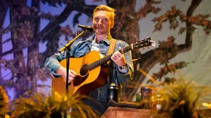 Country Musician Performing Live Wallpaper