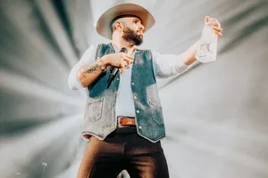 Country Singer Performance Moment Wallpaper