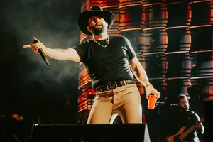 Country Singer Performanceon Stage.jpg Wallpaper