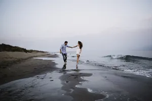 Couple At The Beach Wallpaper