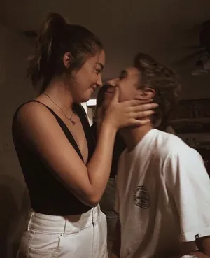 Couple Enjoying A Romantic Moment Together Wallpaper